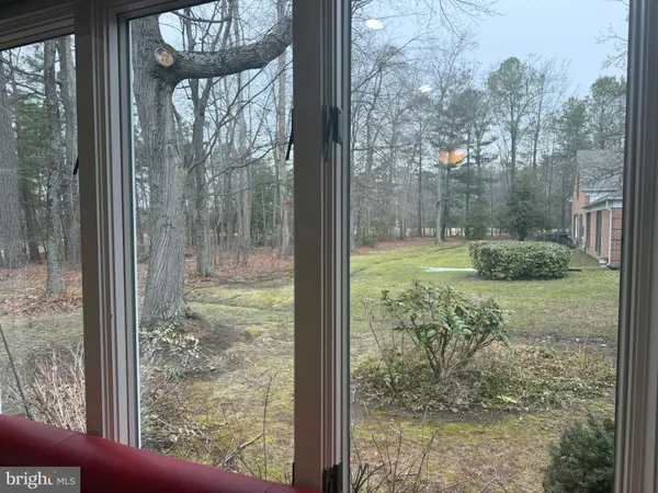 a view of a porch with a yard