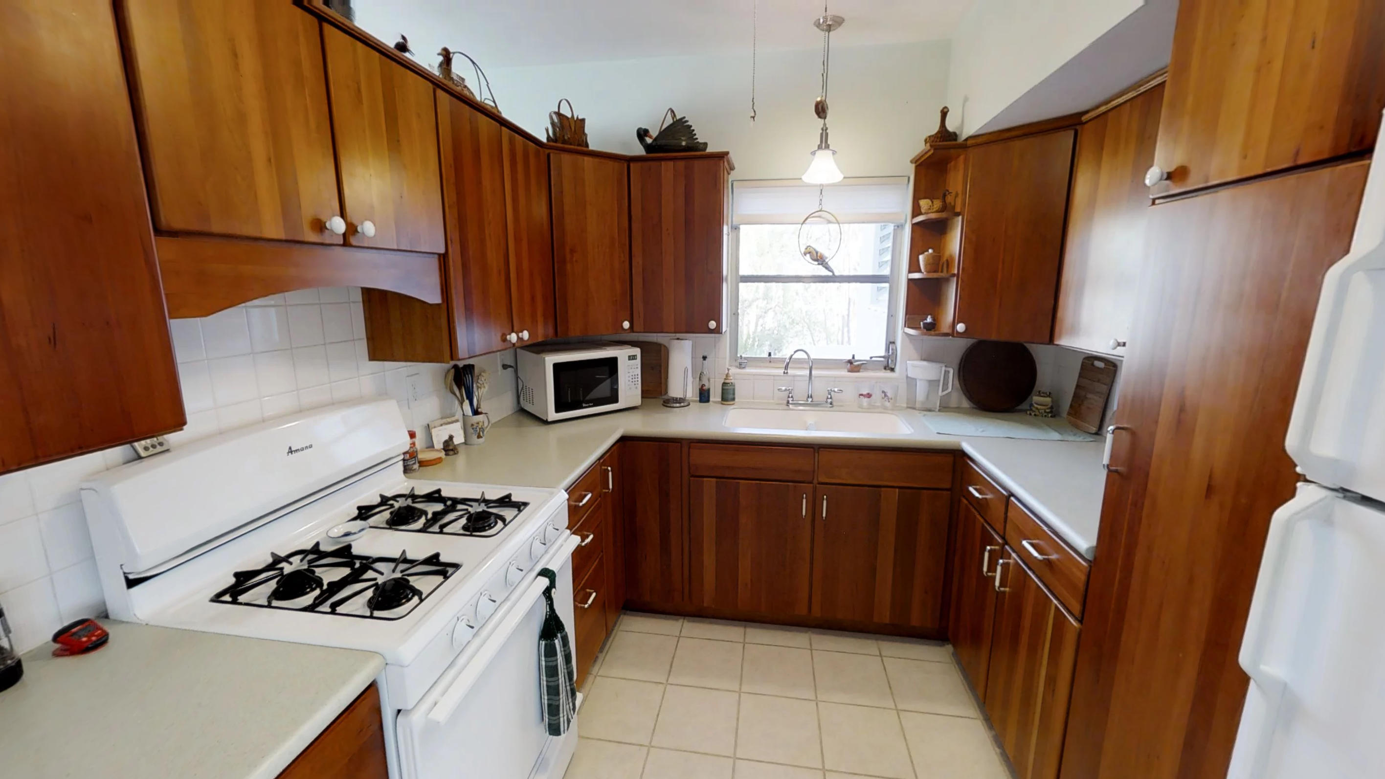 3869 Gillott Road Big Pine Key, FL 33043 - Photo 12 of 33 Kitchen with cherry ccabinets