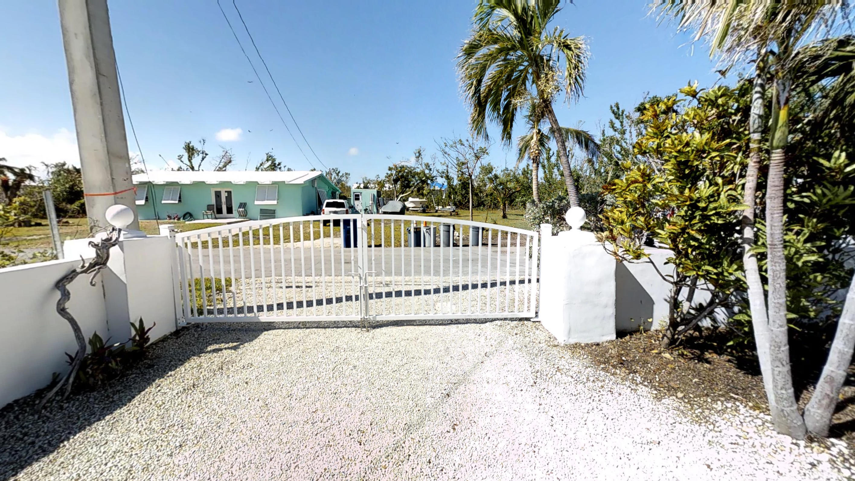Fenced yard with 2 sets of dbl gates