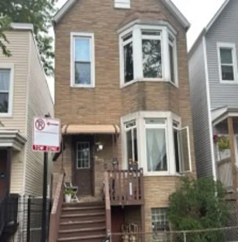 a front view of a building with entryway