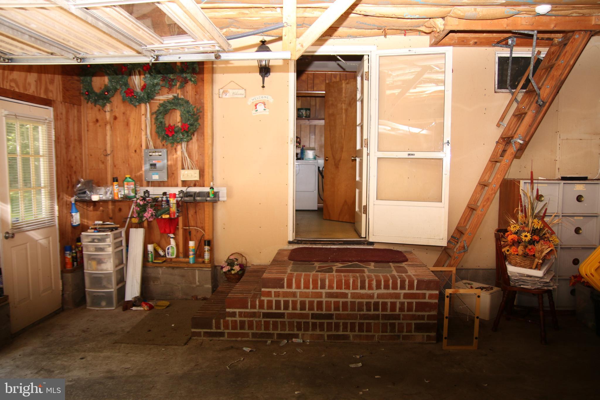 3540 Sheephouse Road Pocomoke City, MD 21851 - Photo 9 of 43 Garage entry to house and attic