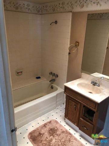 a bathroom with a sink and a bathtub