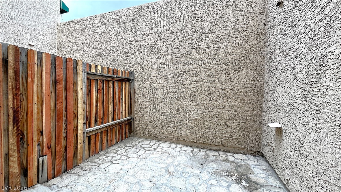 6750 Del Rey Avenue, Unit 123 Las Vegas, NV 89146 - Photo 9 of 21 A private, paved courtyard space perfect for outdoor relaxation or entertaining.
