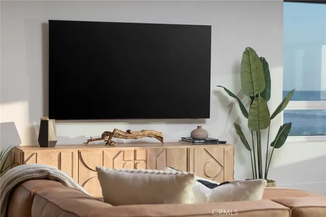 a spacious en suite bathroom with a double vanity sink and a mirror