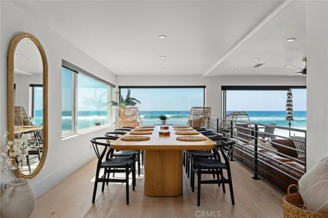 a bedroom with a bed and potted plant