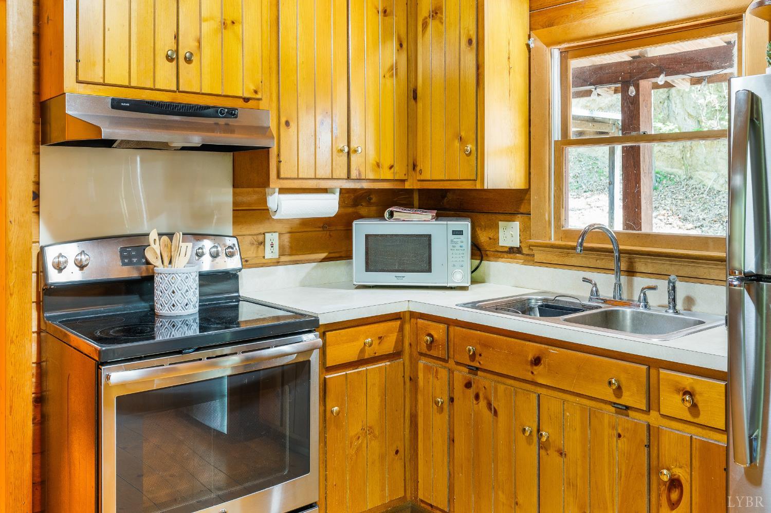 3882 Rocky Mountain Road Forest, VA 24551 - Photo 11 of 69 a kitchen with stainless steel appliances granite countertop a sink stove and cabinets
