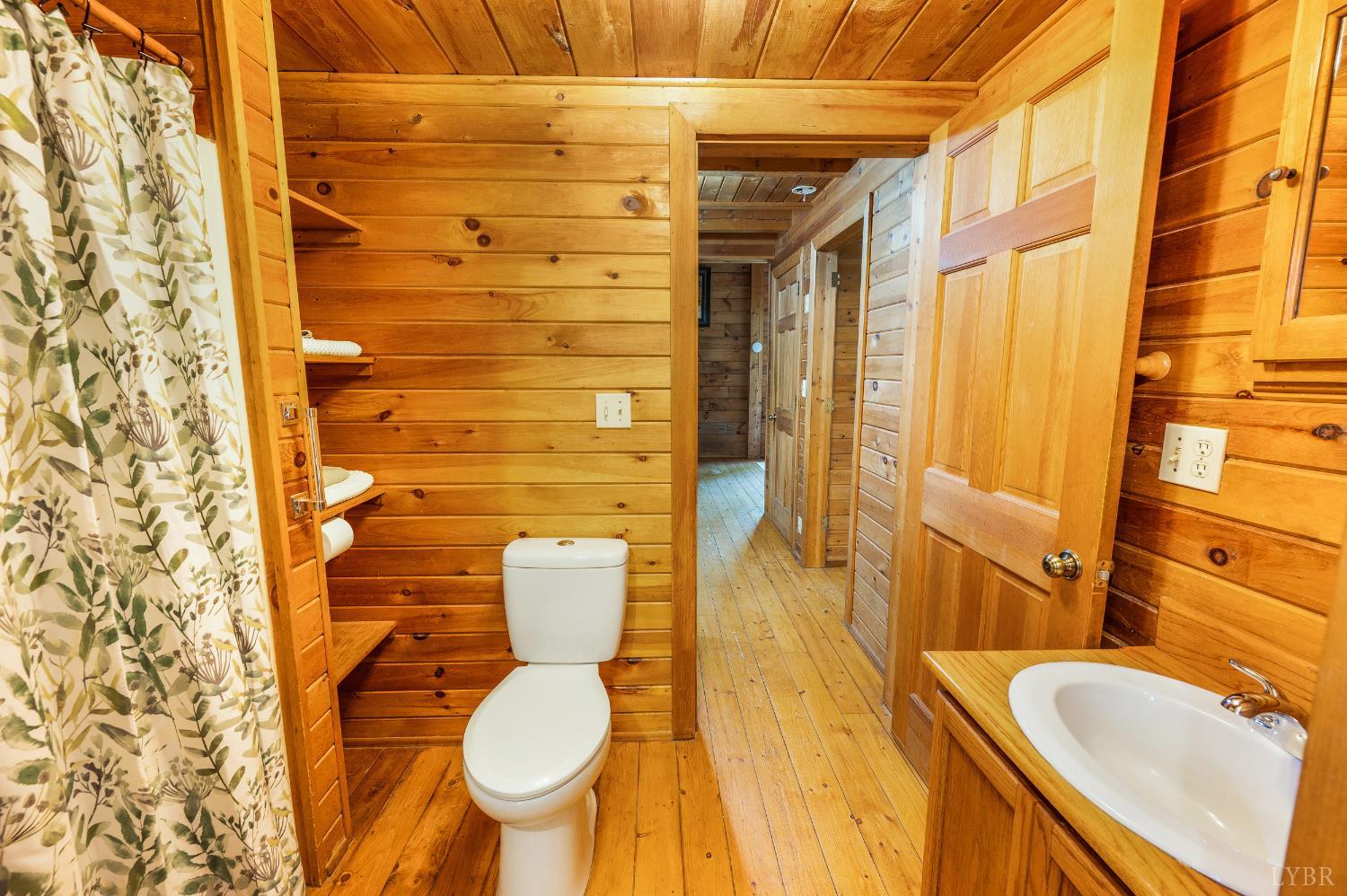 3882 Rocky Mountain Road Forest, VA 24551 - Photo 13 of 69 a bathroom with a sink and toilet