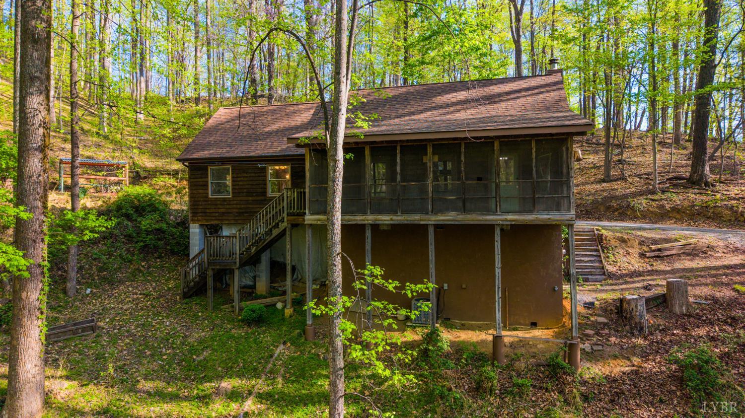 3882 Rocky Mountain Road Forest, VA 24551 - Photo 34 of 69 a backyard of a house with lots of green space