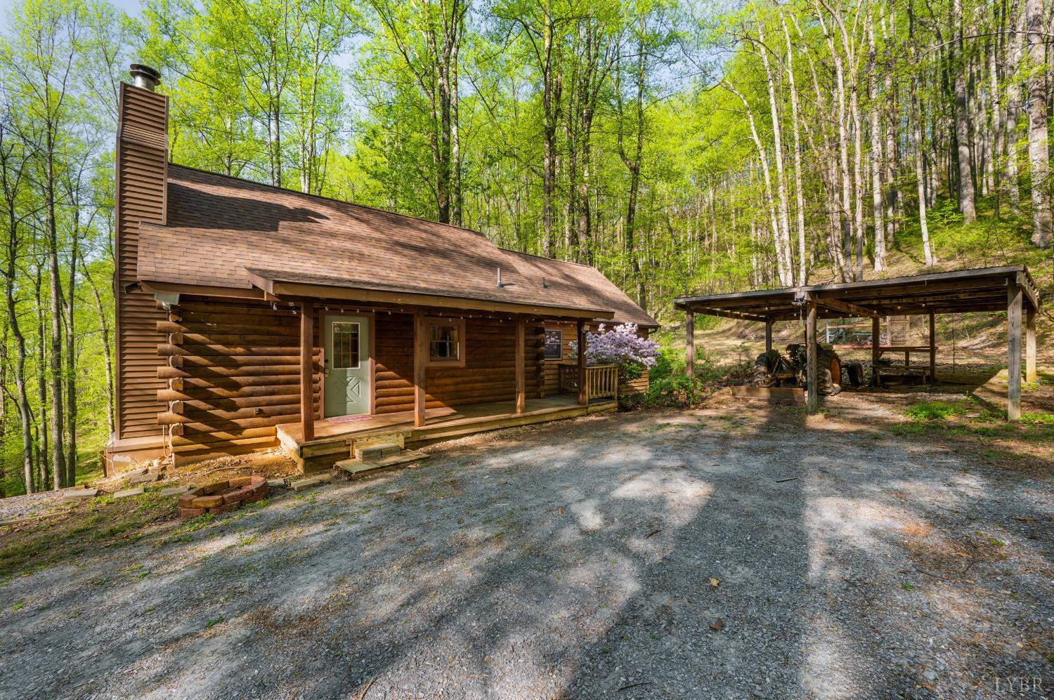 3882 Rocky Mountain Road Forest, VA 24551 - Photo 42 of 69 a front view of a house with a garden