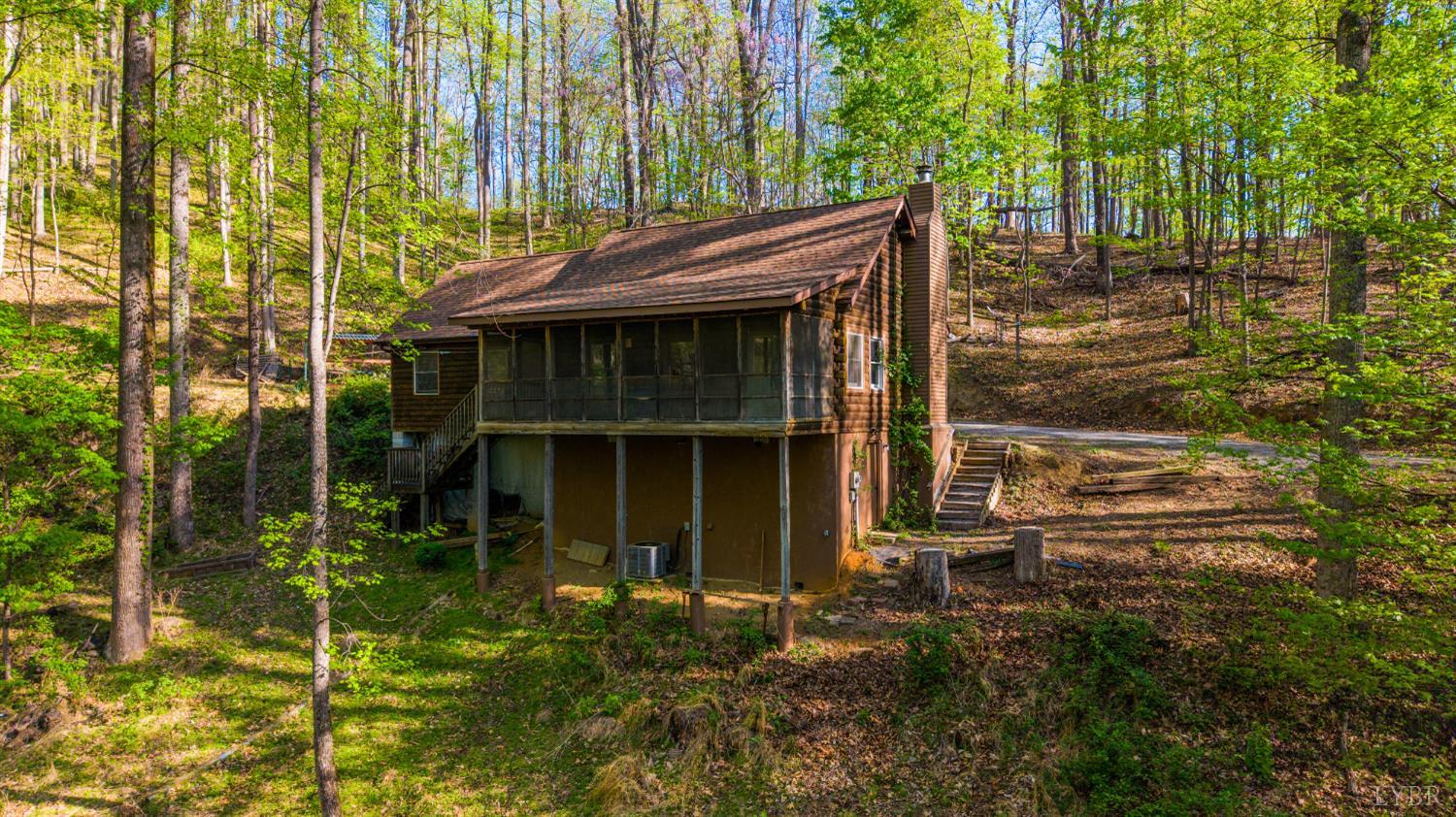 3882 Rocky Mountain Road Forest, VA 24551 - Photo 49 of 69 a view of house with backyard and outdoor seating