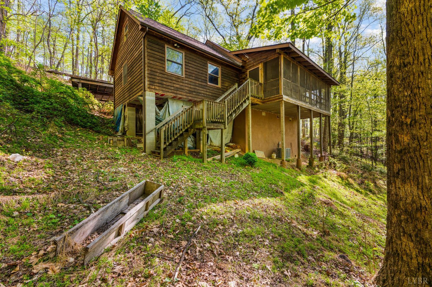 3882 Rocky Mountain Road Forest, VA 24551 - Photo 50 of 69 a front view of a house with garden