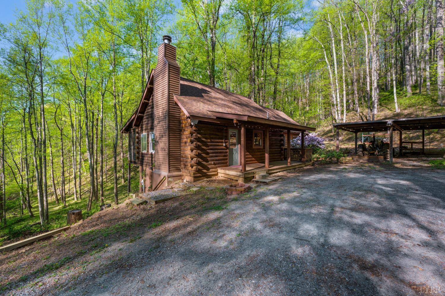3882 Rocky Mountain Road Forest, VA 24551 - Photo 55 of 69 a front view of a house with a garden
