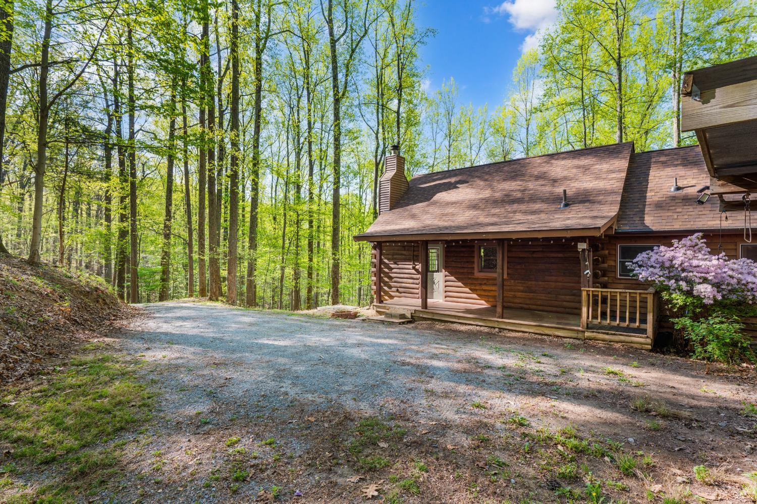 3882 Rocky Mountain Road Forest, VA 24551 - Photo 58 of 69 a view of a house with backyard and a tree
