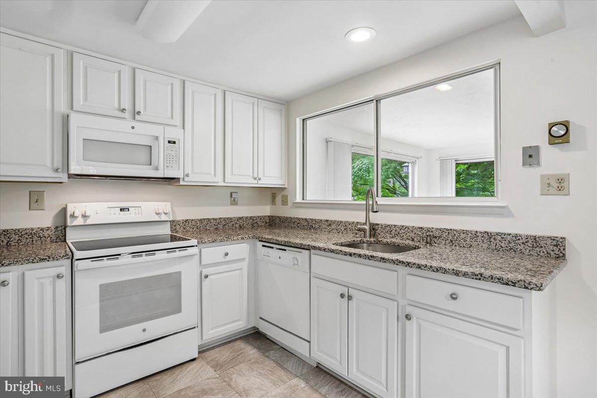 15133 Vantage Hill Road, Unit 7C Silver Spring, MD 20906 - Photo 6 of 22 Updated kitchen with granite