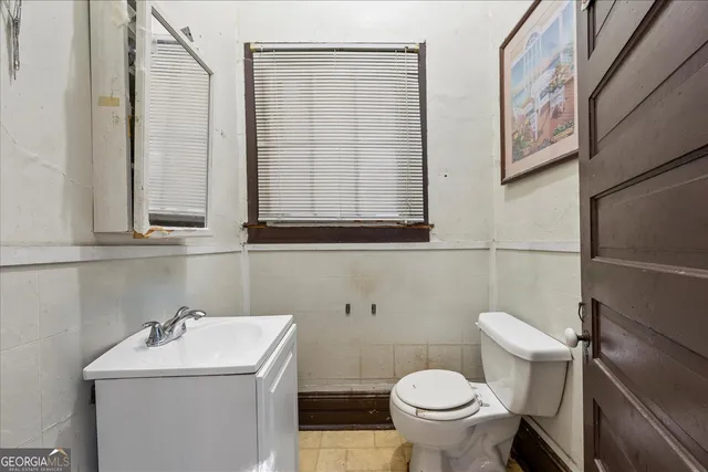 a bathroom with a sink and a toilet