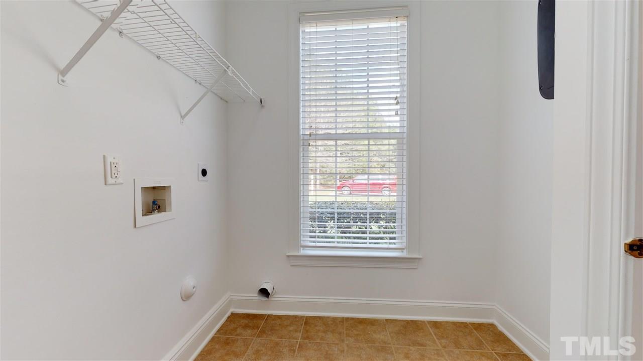 11245 Maplecroft Court Raleigh, NC 27617 - Photo 21 of 30 Oversized laundry room on first floor w/ utility sink.
