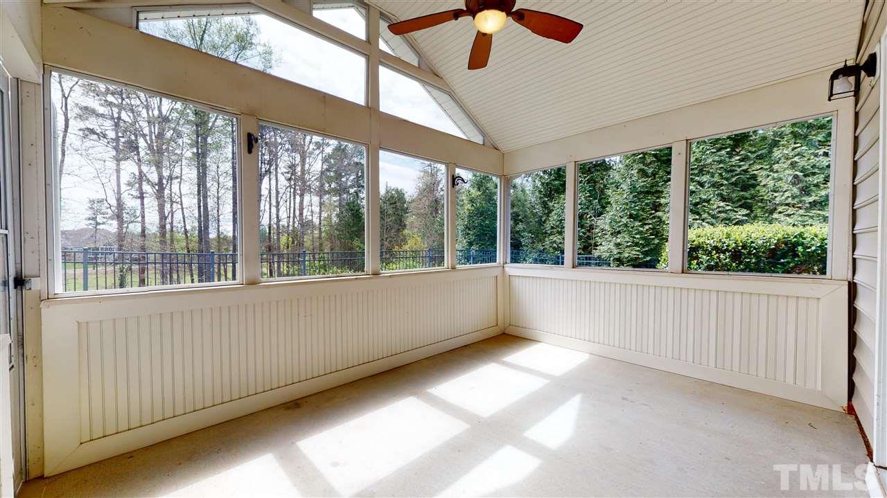 11245 Maplecroft Court Raleigh, NC 27617 - Photo 22 of 30 Enjoy quiet Carolina nights w/ screened in porch & private patio overlooking the 6th hole!