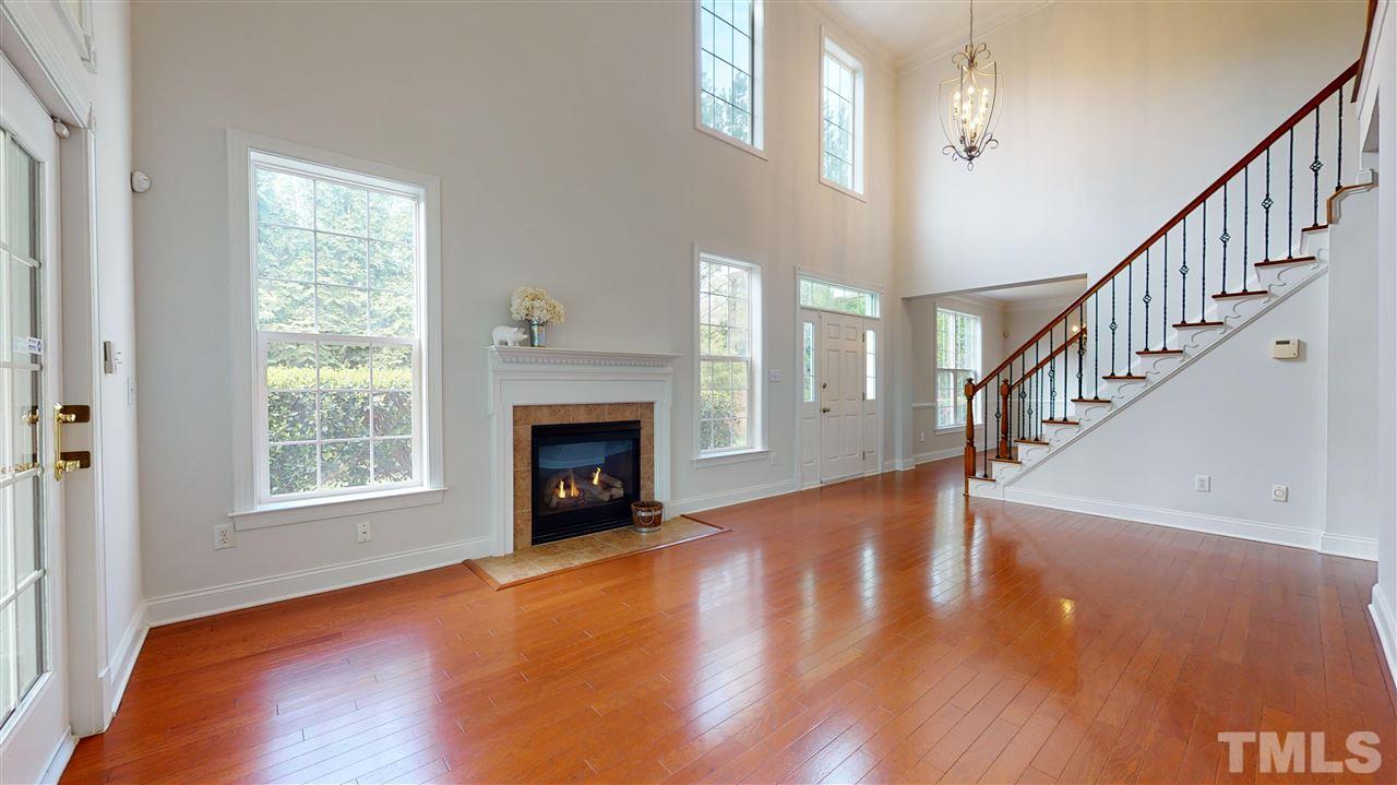 11245 Maplecroft Court Raleigh, NC 27617 - Photo 30 of 30 Open floorplan great for entertaining w/ spacious family room feat. vaulted ceiling & gas log fireplace.