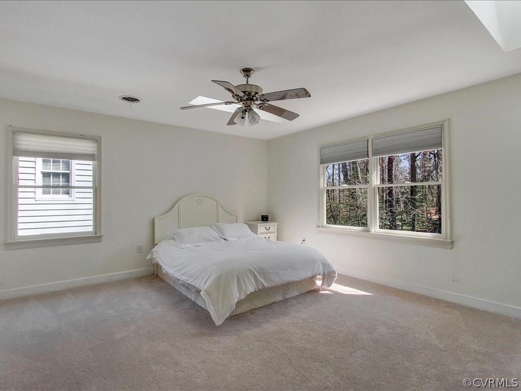 5603 Sandstone Ridge Road Midlothian, VA 23112 - Photo 18 of 39 a bedroom with a bed and a window