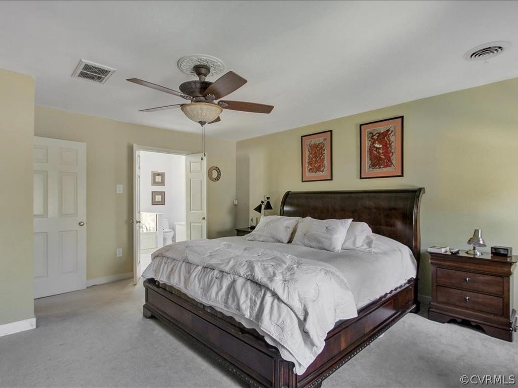 5603 Sandstone Ridge Road Midlothian, VA 23112 - Photo 24 of 39 a bedroom with a bed and ceiling fan