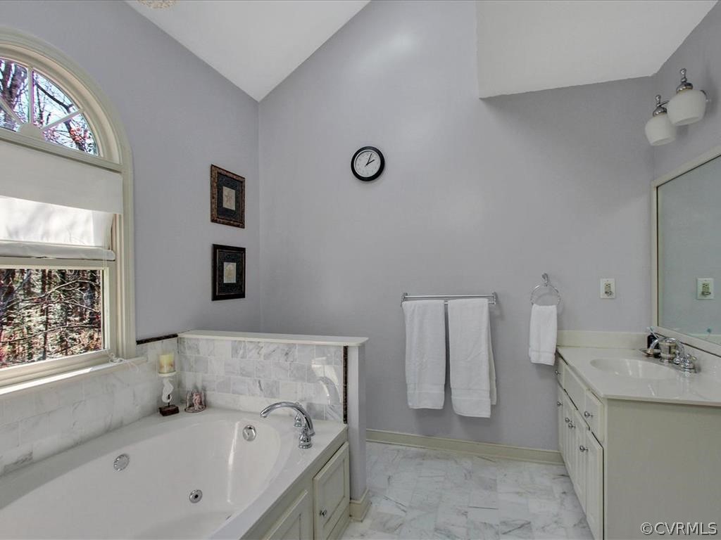 5603 Sandstone Ridge Road Midlothian, VA 23112 - Photo 26 of 39 a bathroom with a bathtub and a sink
