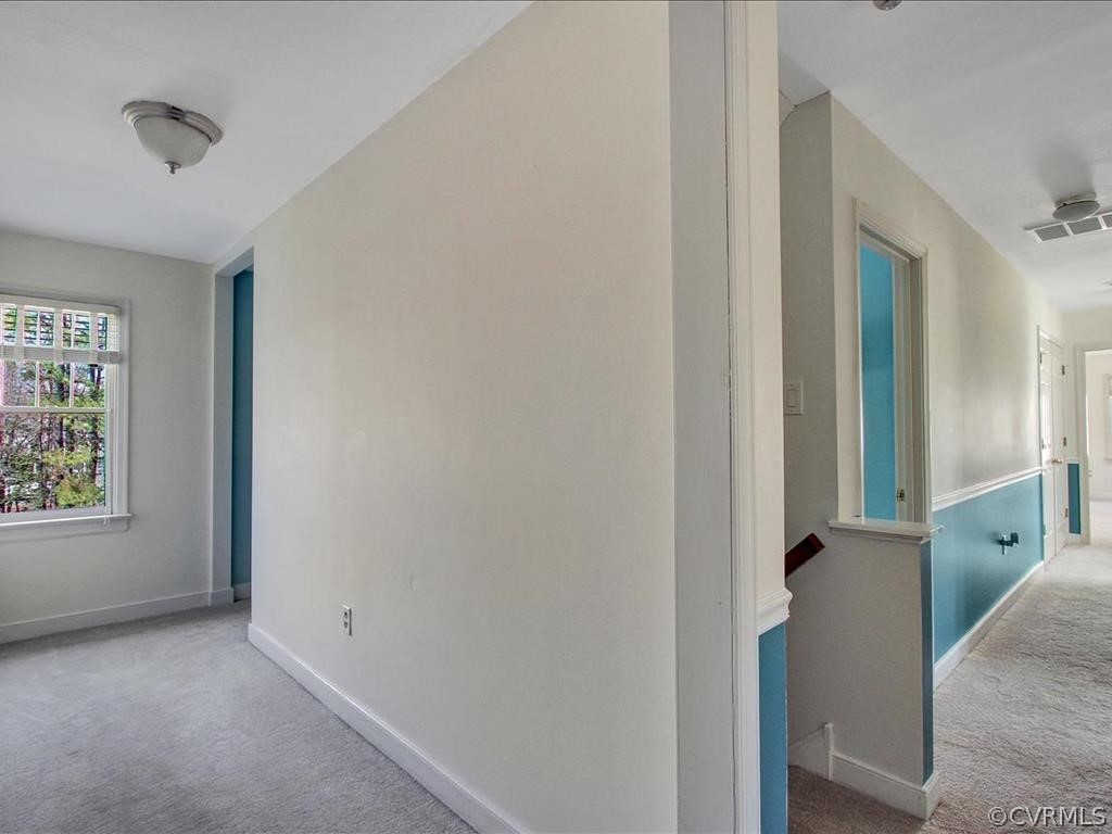 5603 Sandstone Ridge Road Midlothian, VA 23112 - Photo 28 of 39 an empty room with windows and closet