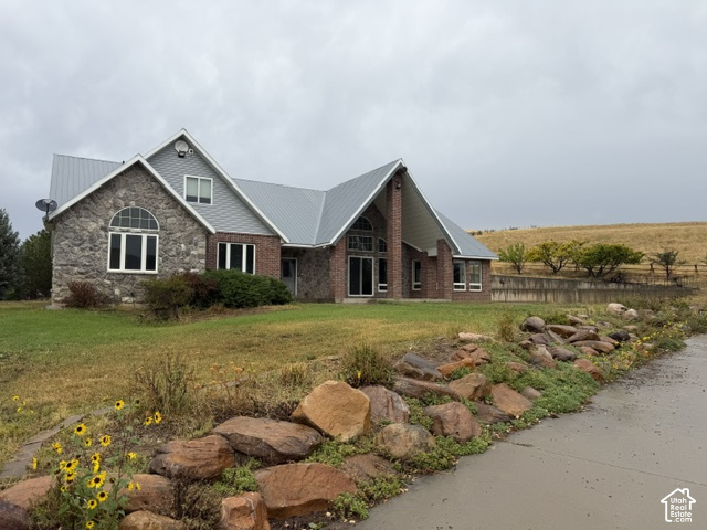 4458 East Glencoe Road Preston, ID 83263 - Photo 1 of 52 Stone and brick exterior with a metal roof