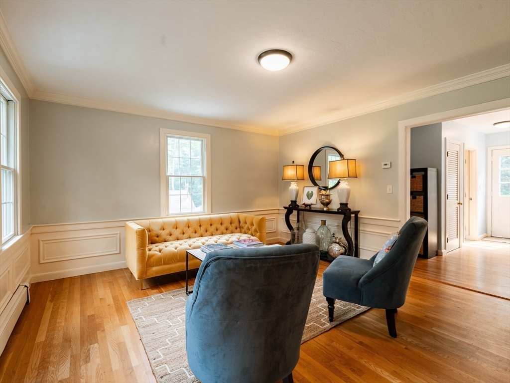 17 Gardner Road Duxbury, MA 02332 - Photo 26 of 42 a living room with furniture and a wooden floor