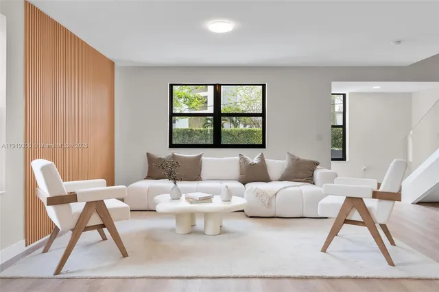 a living room with a couch and a table