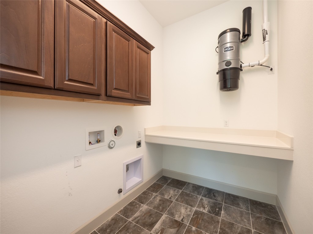 13503-13511 Carpenter Lane Manchaca, TX 78652 - Photo 13 of 40 a bathroom with a sink and a mirror