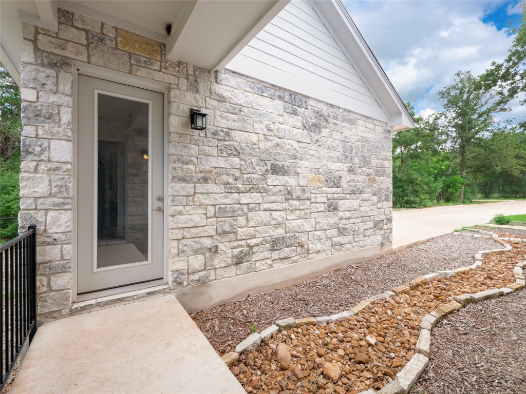 13503-13511 Carpenter Lane Manchaca, TX 78652 - Photo 14 of 40 a view of a door of the house
