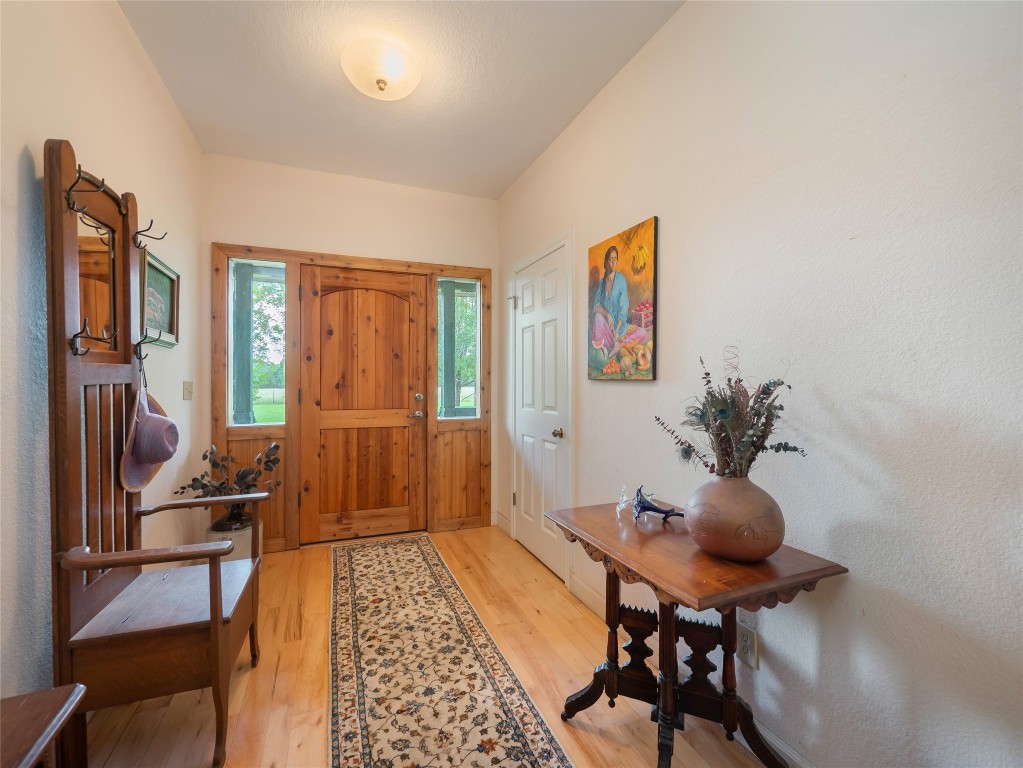 13503-13511 Carpenter Lane Manchaca, TX 78652 - Photo 20 of 40 a view of a workspace with furniture and a window