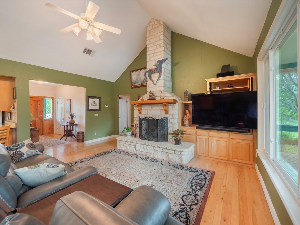 13503-13511 Carpenter Lane Manchaca, TX 78652 - Photo 21 of 40 a living room with furniture and a fireplace