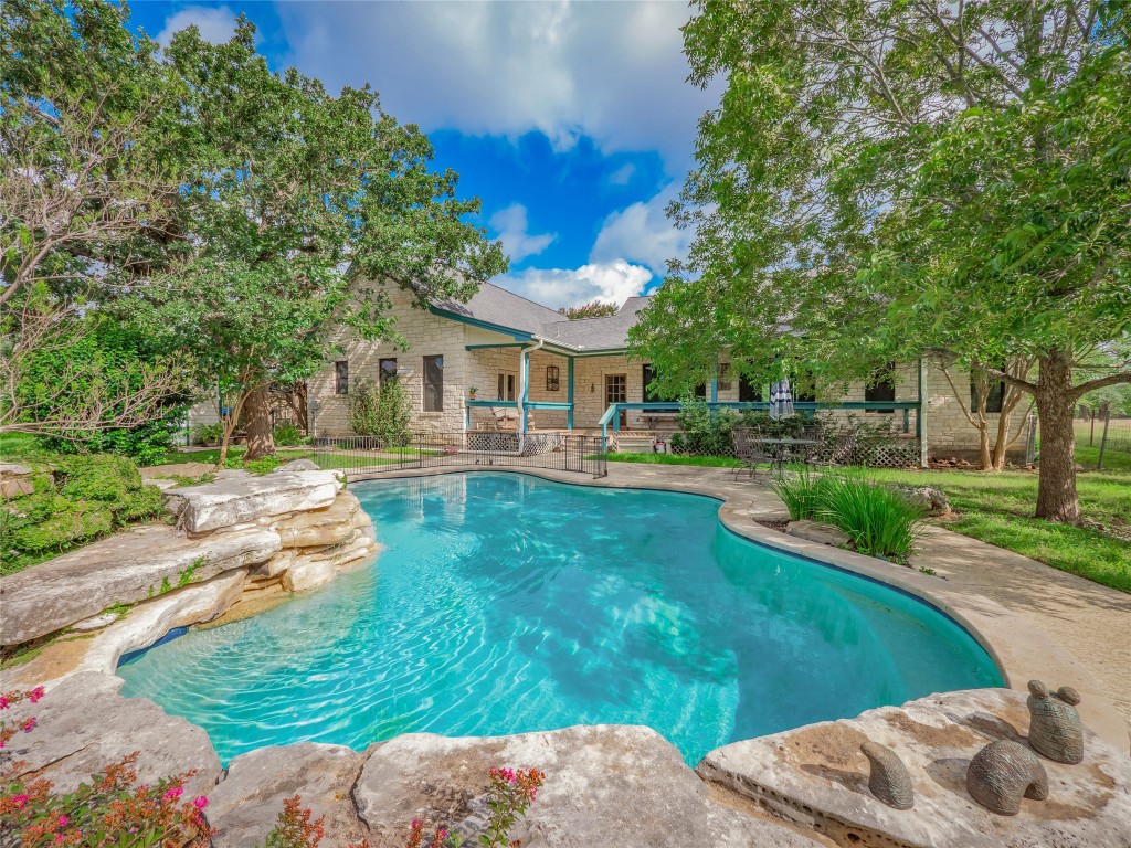 13503-13511 Carpenter Lane Manchaca, TX 78652 - Photo 33 of 40 a view of a house with a yard