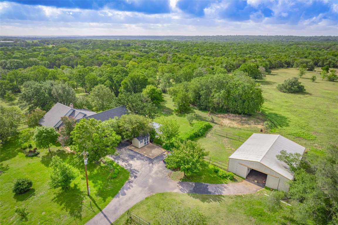 13503-13511 Carpenter Lane Manchaca, TX 78652 - Photo 37 of 40 an aerial view of a house with garden