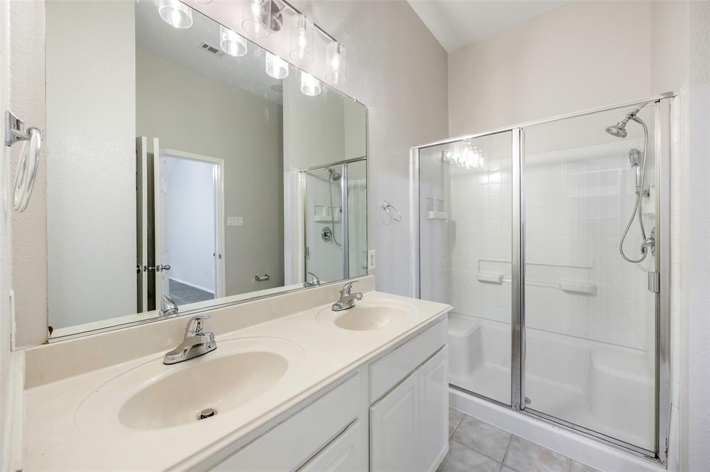 3603 Cottonwood Road Melissa, TX 75454 - Photo 10 of 22 Full bath with a shower stall, light tile patterned flooring, and double vanity