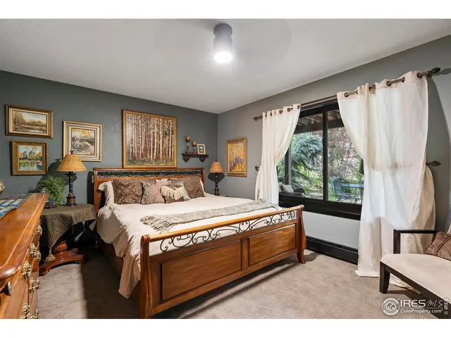 a bathroom with a sink a mirror and shower