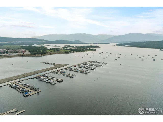 a view of a house with a mountain in the background