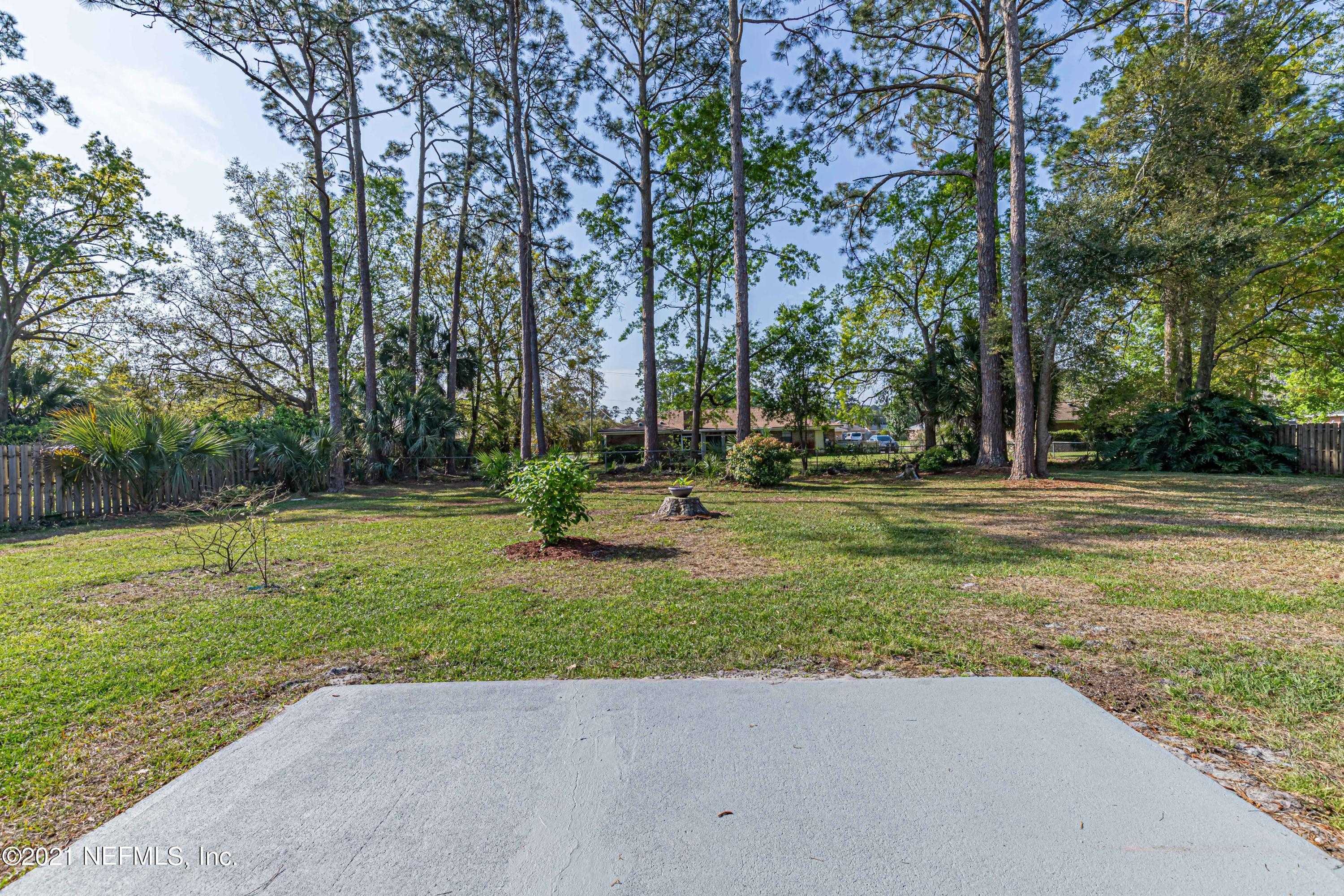 6156 Duclay Road Jacksonville, FL 32244 - Photo 17 of 38 REAR PATIO & PICTURESQUE VIEW