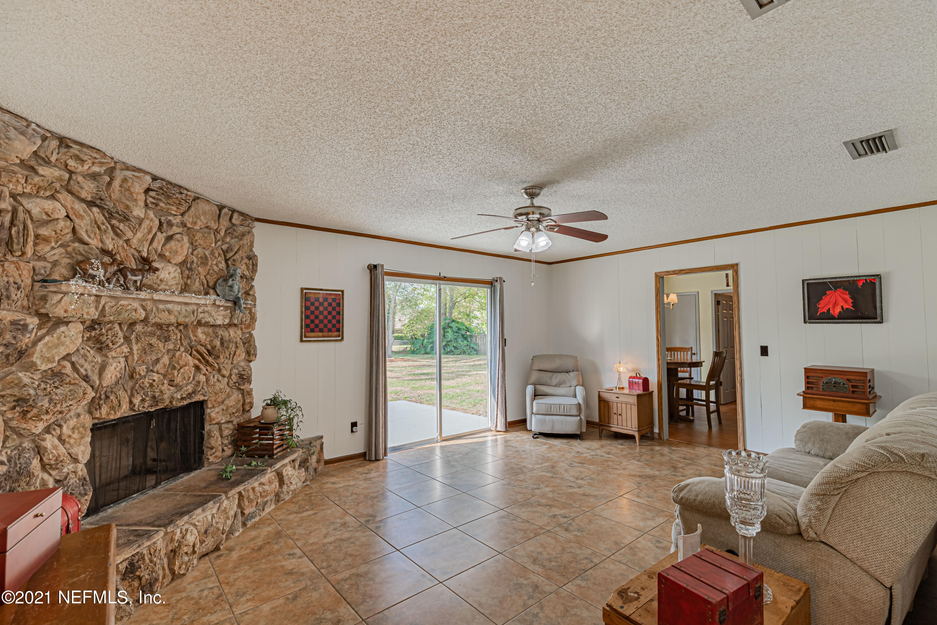 6156 Duclay Road Jacksonville, FL 32244 - Photo 25 of 38 FAMILY ROOM & REAR SLIDER