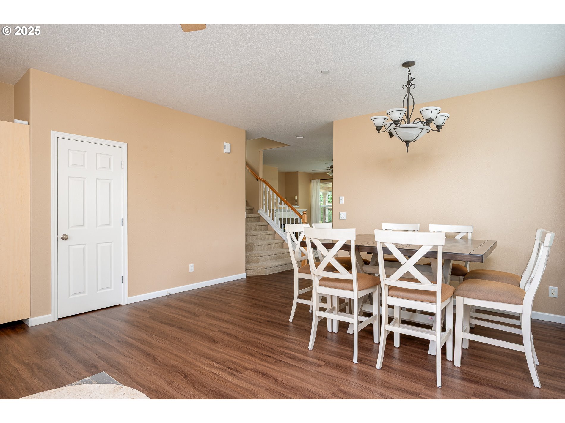 10636 Southwest 43rd Avenue Portland, OR 97219 - Photo 12 of 48 a view of a dining room with furniture and wooden floor