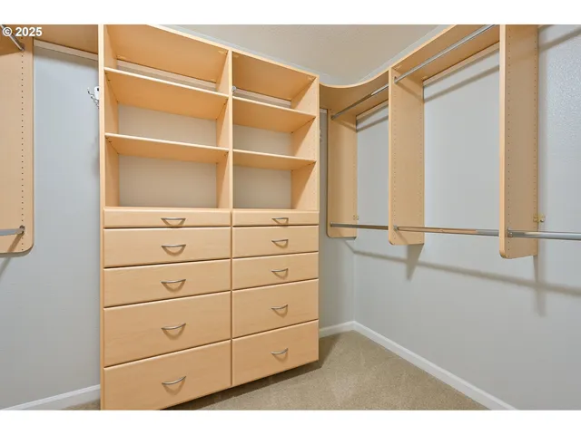 a view of an empty walk in closet