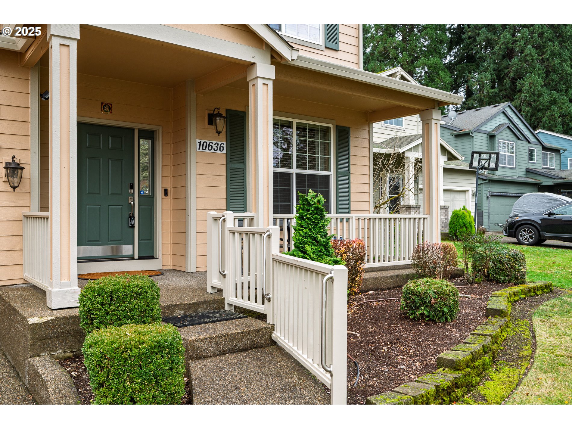 10636 Southwest 43rd Avenue Portland, OR 97219 - Photo 3 of 48 front view of a house with a porch
