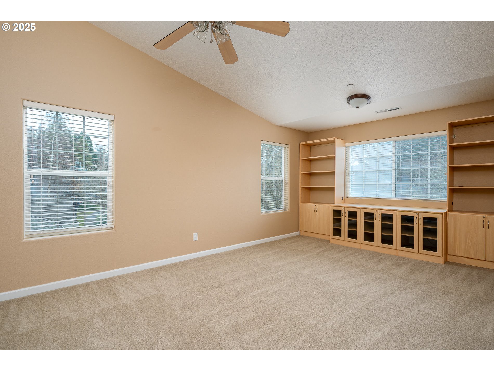 10636 Southwest 43rd Avenue Portland, OR 97219 - Photo 37 of 48 a view of an empty room with a window