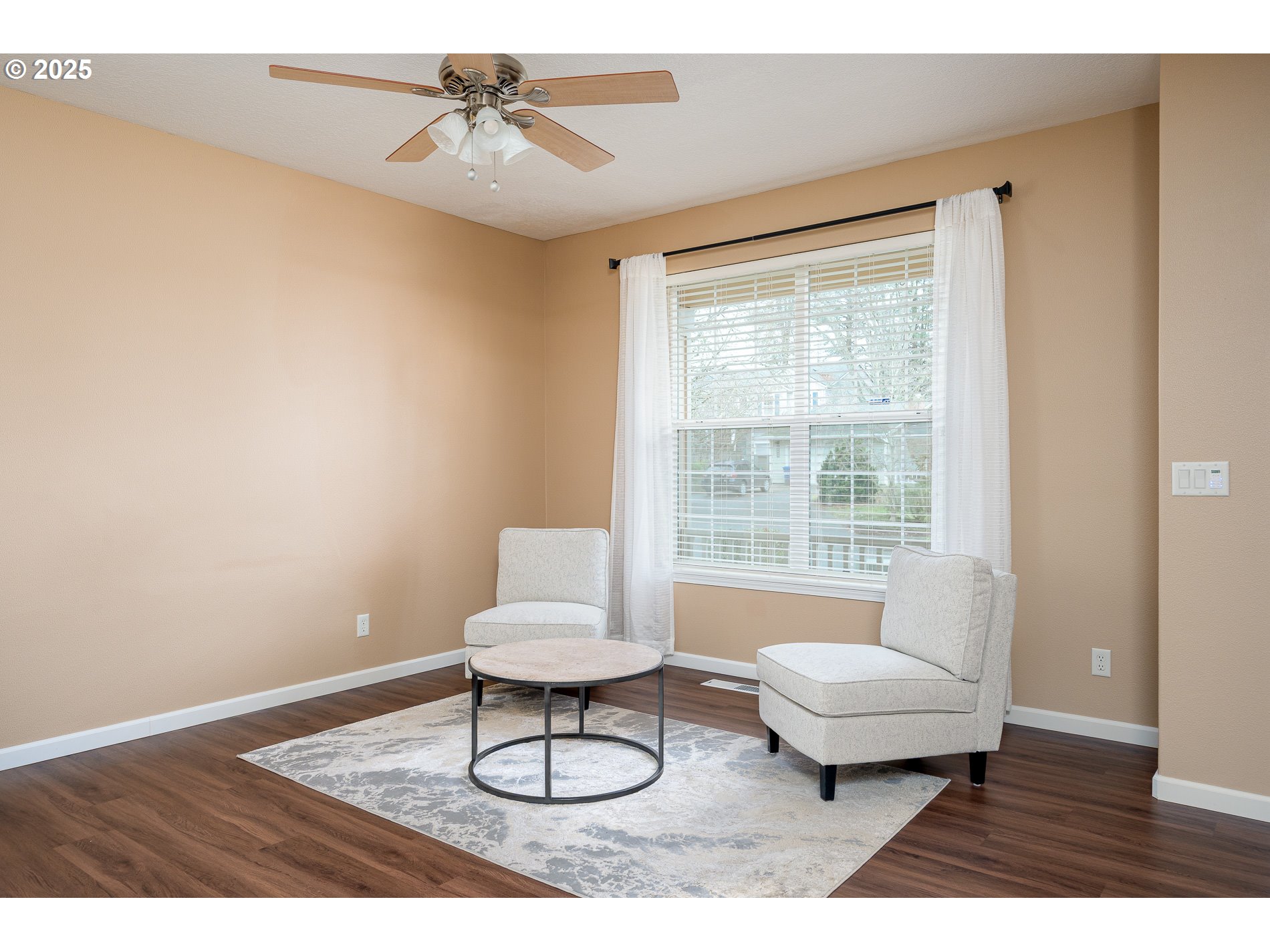 10636 Southwest 43rd Avenue Portland, OR 97219 - Photo 5 of 48 a living room with furniture and a window