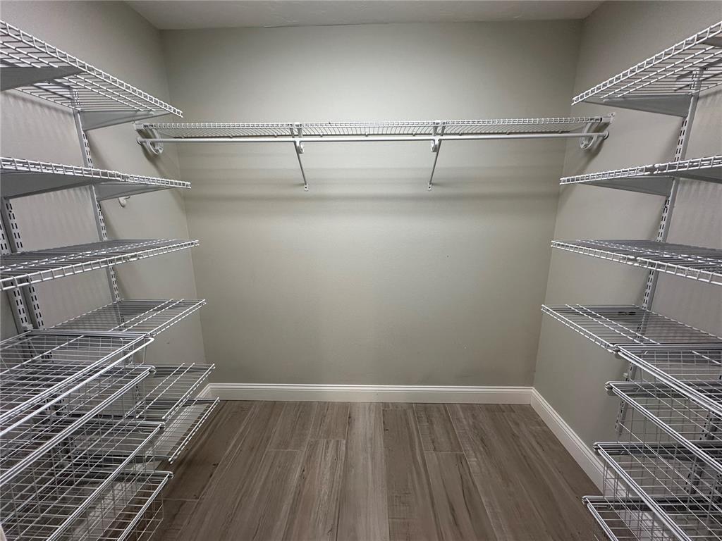 195 Inlets Boulevard, Unit 195 Nokomis, FL 34275 - Photo 32 of 48 a view of a room with racks on the wall