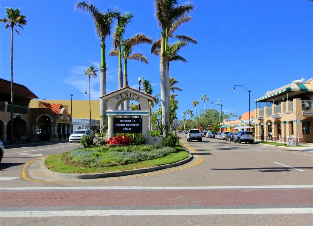 195 Inlets Boulevard, Unit 195 Nokomis, FL 34275 - Photo 48 of 48 a front view of a building with garden
