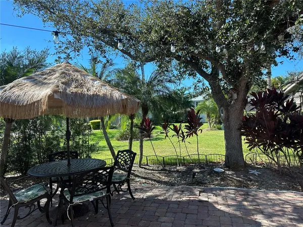 a view of an outdoor sitting area with golf course