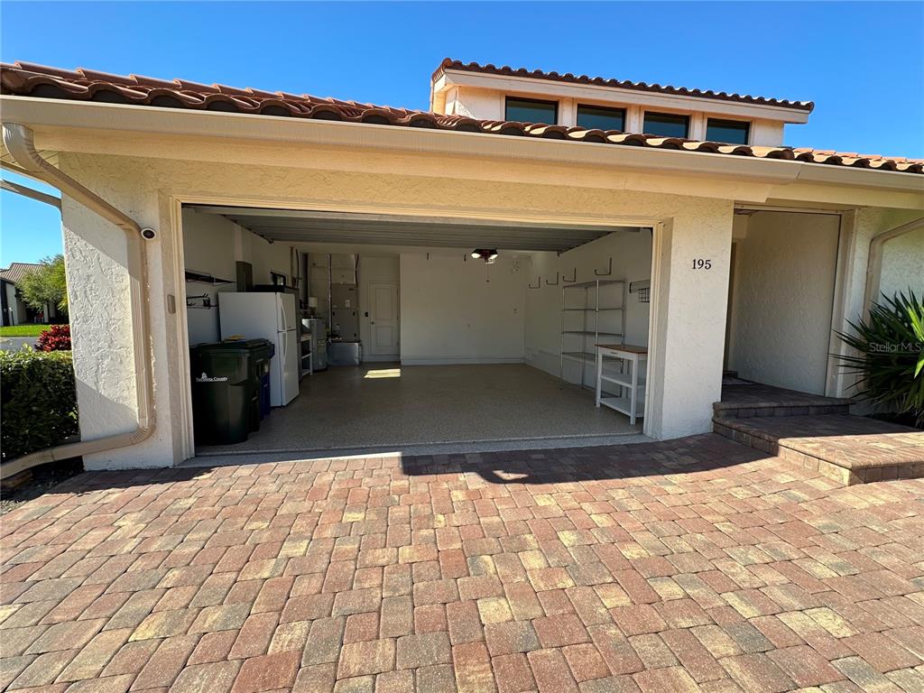 195 Inlets Boulevard, Unit 195 Nokomis, FL 34275 - Photo 7 of 48 a view of a building with a hallway