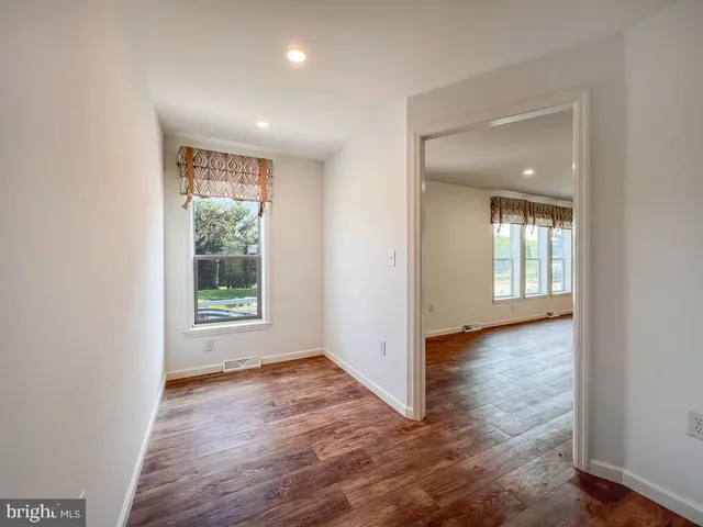 a view of entryway with wooden floor